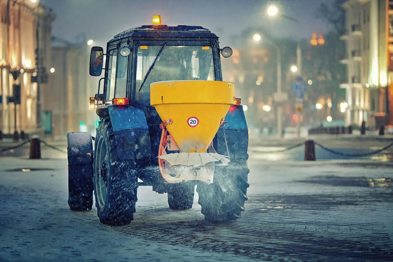 Salt spreader spreading salt on street